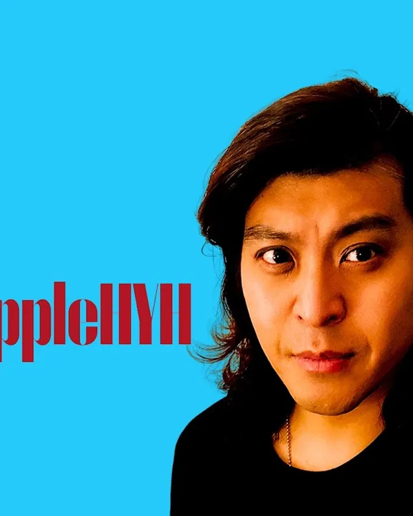 愛波哥的 YouTube 頻道肖像：留著側分長髮、身穿黑衣，站在亮藍背景前，左側排有紅色 AppleHYH 字樣